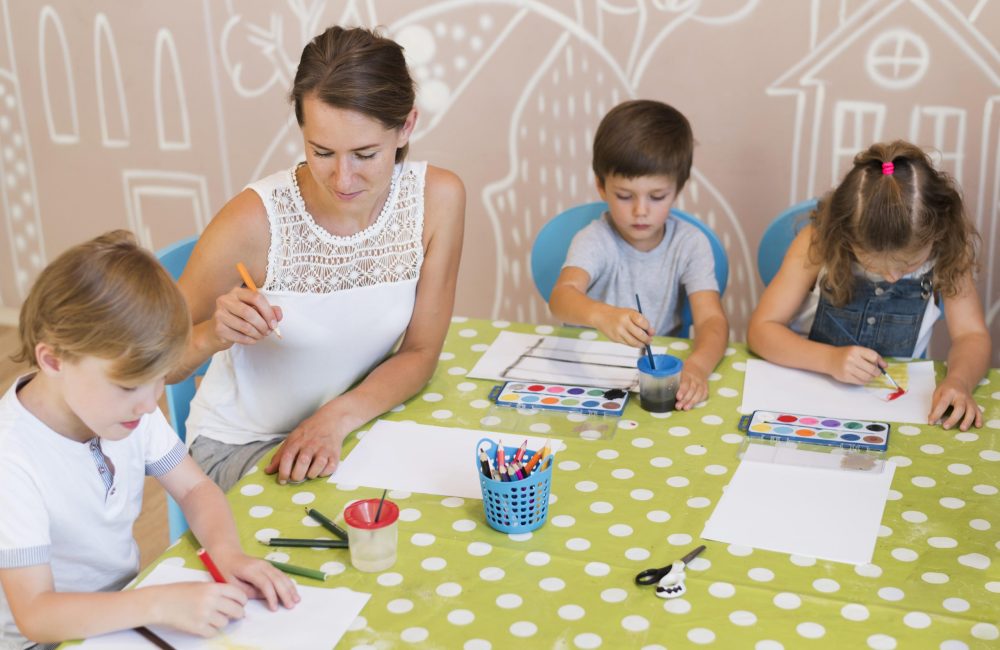 medium-shot-kids-painting-table